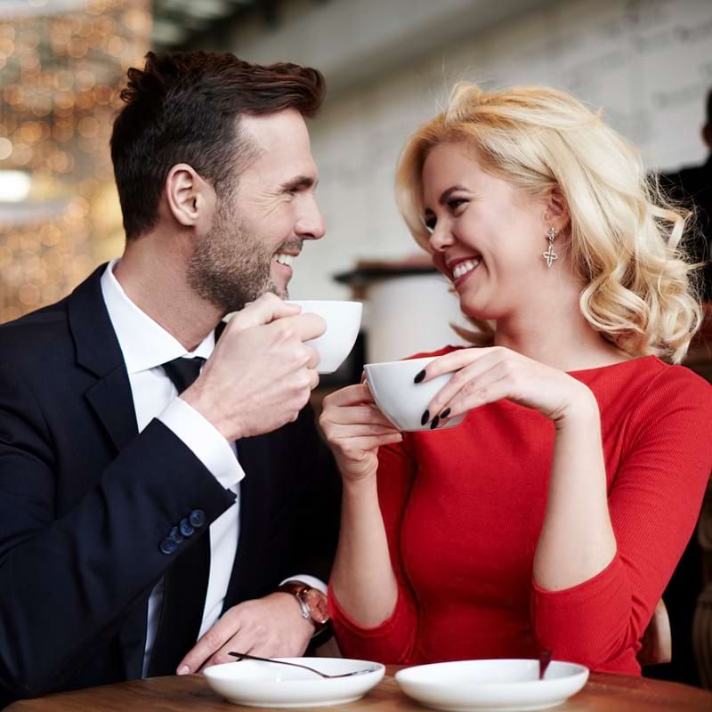 Elegant couple enjoying fine dining